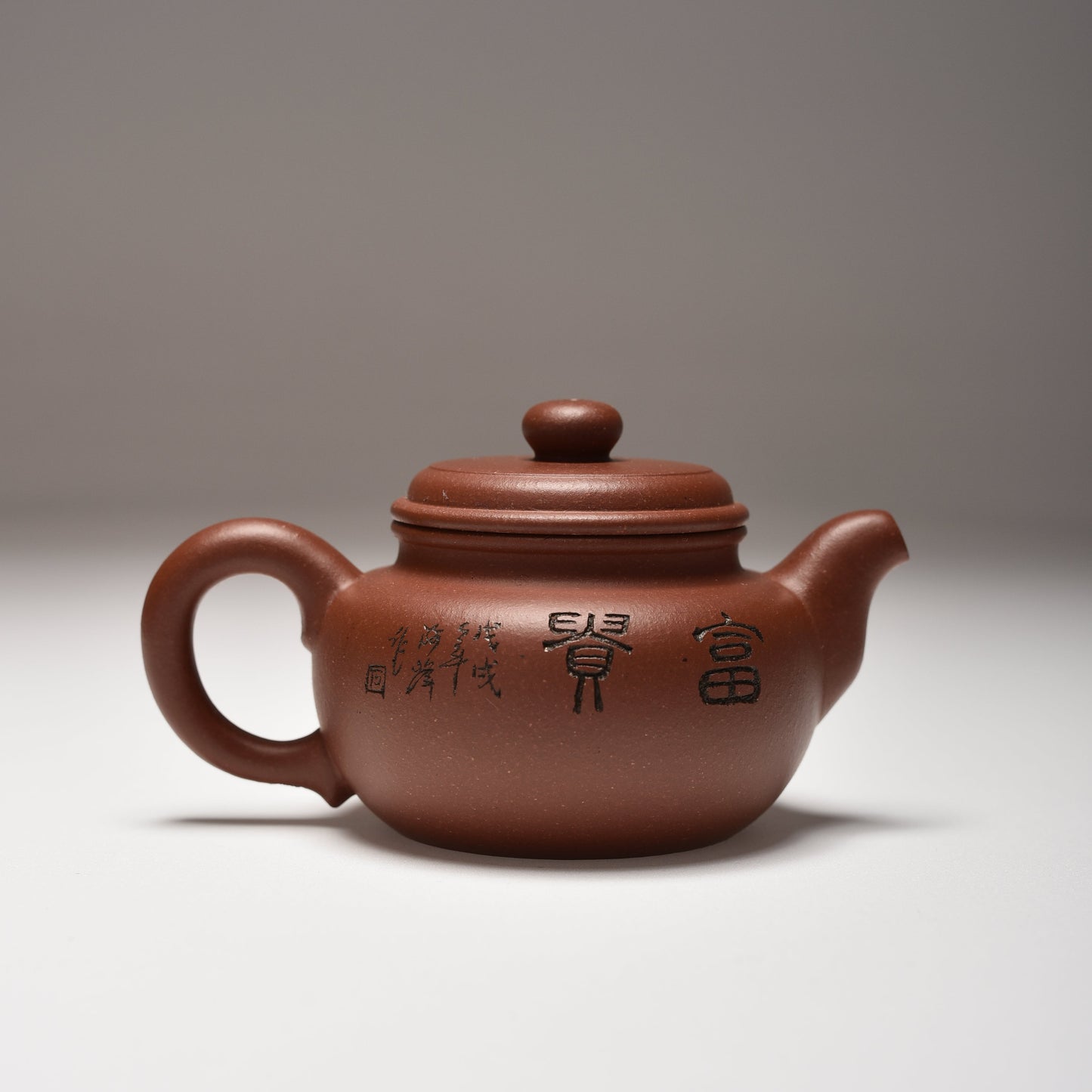 Fang Gu (120ml) Dicaoqing Clay Yixing Teapot with Carving