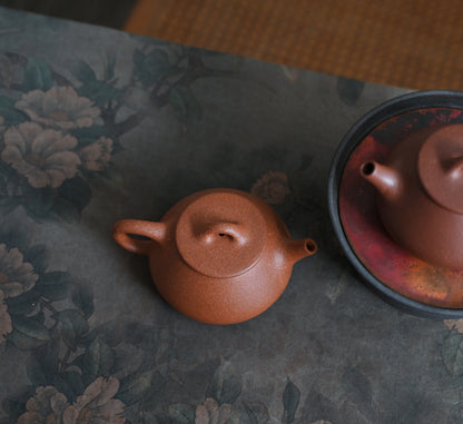 Flat Lid Shi Piao(150 ml) Red Jiang Po Ni Clay Yixing Teapot